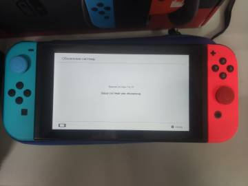 01-200181725: Nintendo switch with neon blue and neon red